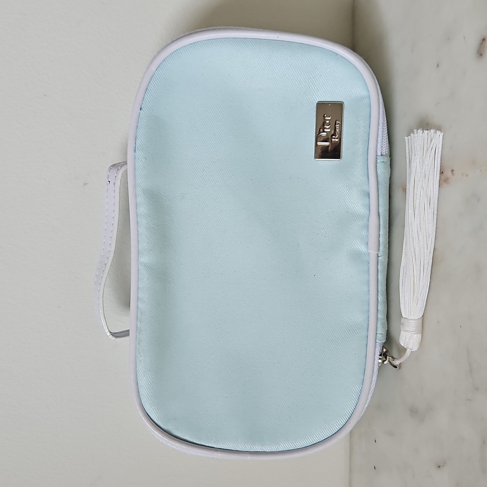 DIOR: NWOT small baby blue cosmetic bag